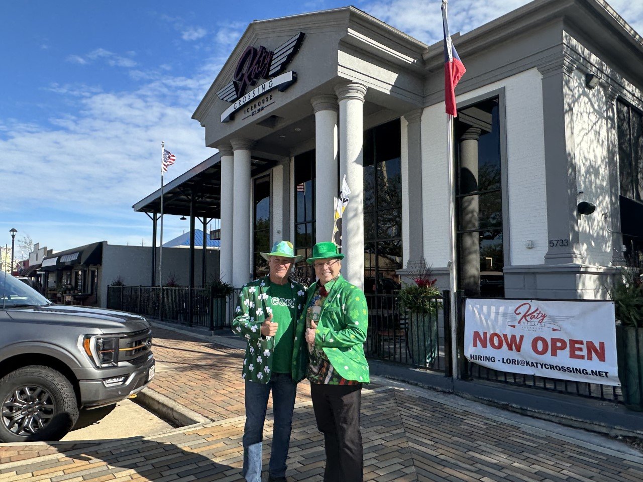 Bill Fanning, left, Katy Crossing Icehouse owner, and Don McCoy, Fulshear-Katy Area Chamber of Commerce president, show off their St. Patrick’s Day attire in front of the icehouse.